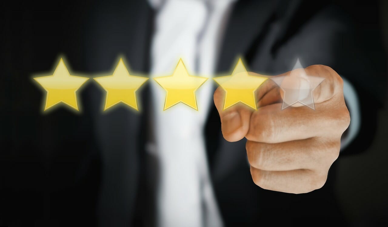  magnifying glass enlarging positive customer review stars, surrounded by local businesses, with influencers holding megaphones amplifying the businesses' visibility